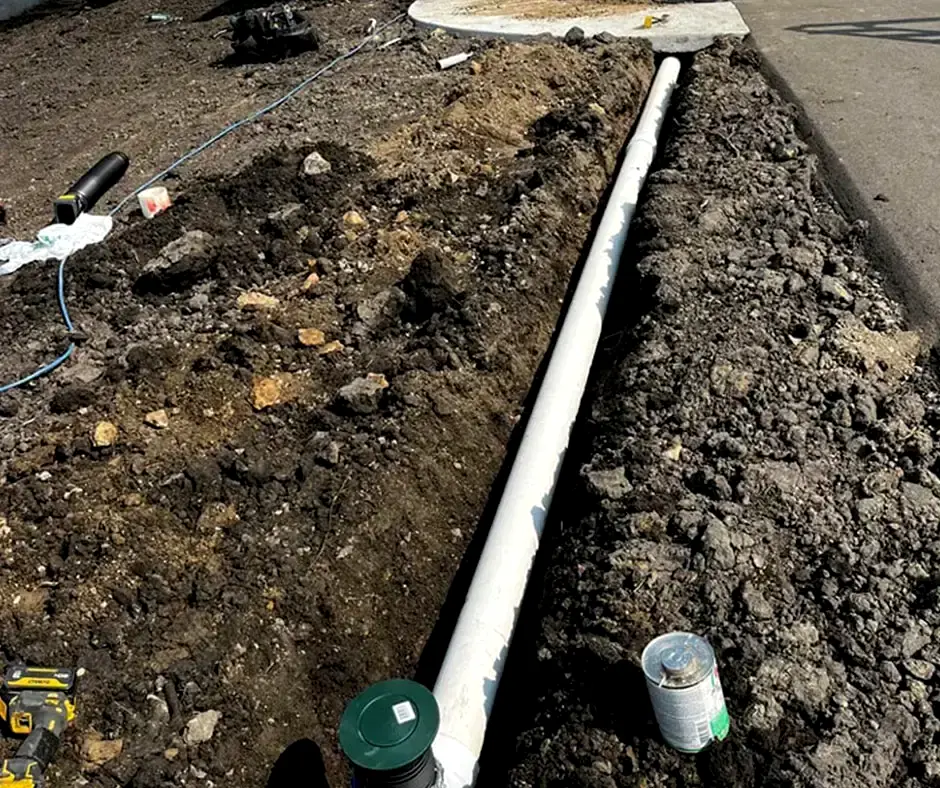 Drainage pipe with black grating French Drain Installation Richmond, VA