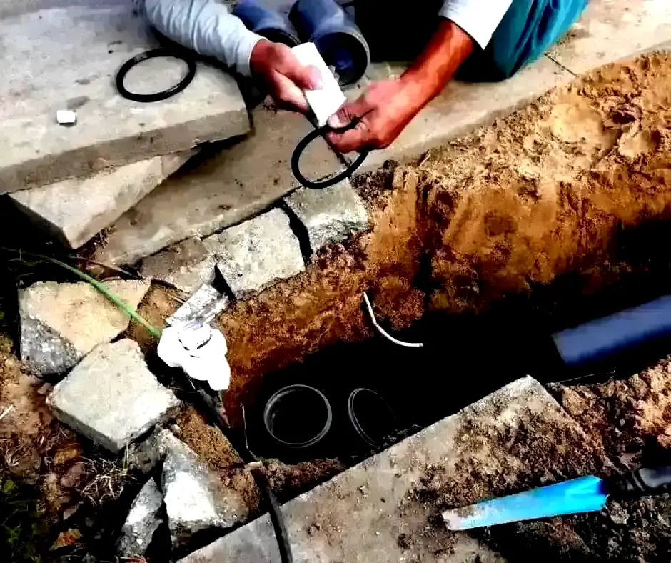 Hands assembling French Drain Installation Lexington, KY Hands assembling French Drain Installation Lexington, KY